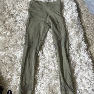 Green leggings with sheer cut outs